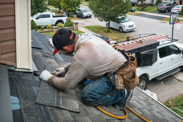 Professional Roofing technician working in Silvis, IL
